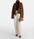 Savette Symmetry Pochette leather top-handle bag
