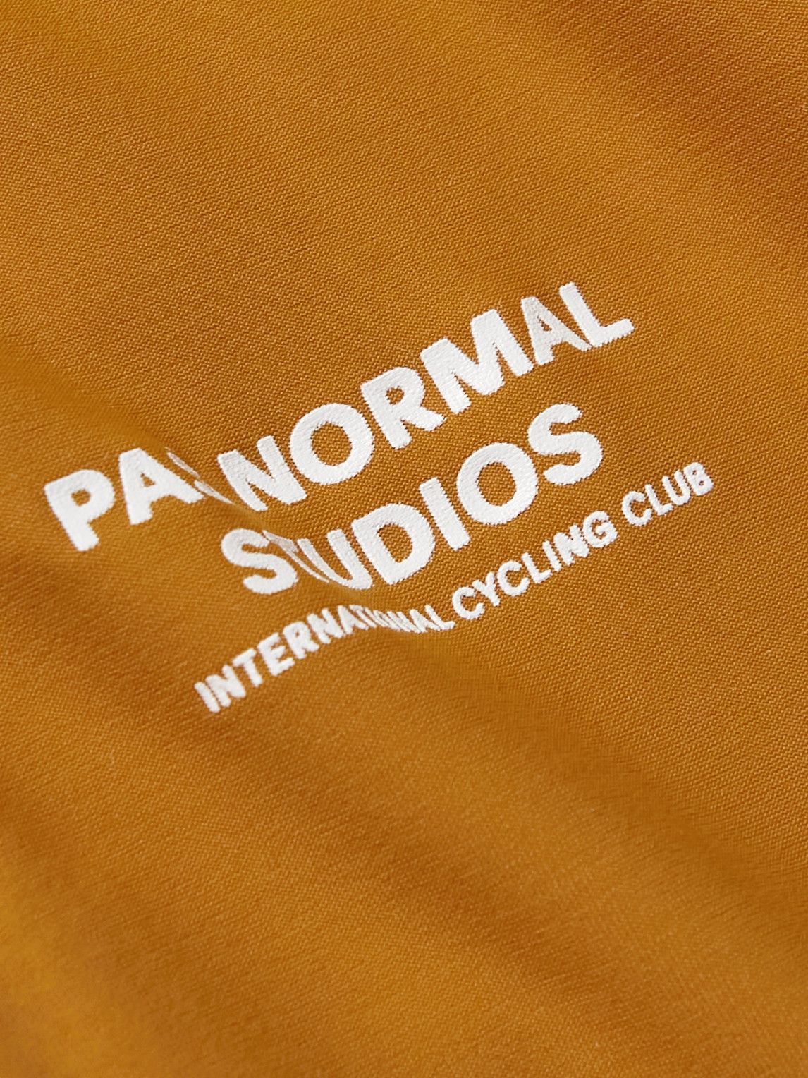 Sleeveless bike base layer Pas Normal Studios Control Orange