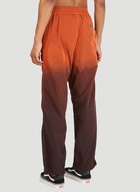 Spray-Dyed Windcheater Pants in Orange