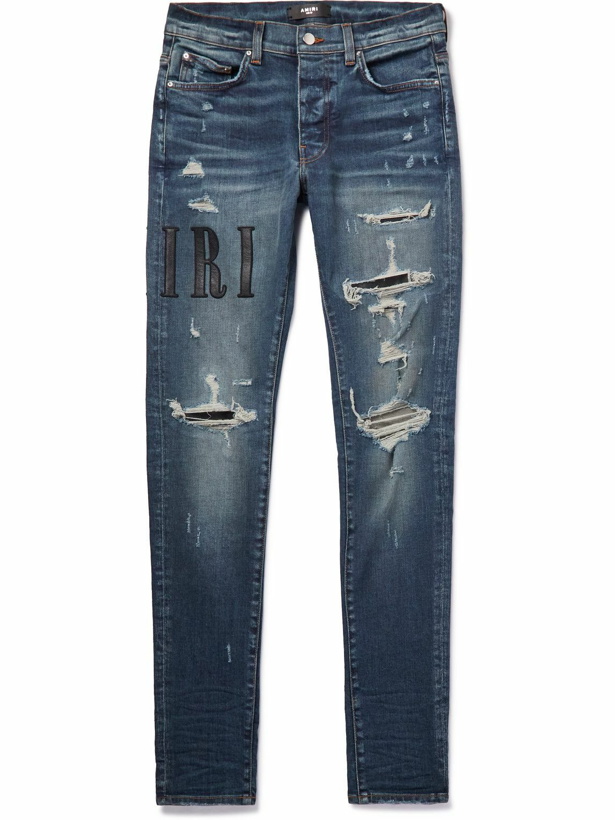 Photo: AMIRI - Skinny-Fit Leather-Appliquéd Distressed Jeans - Blue