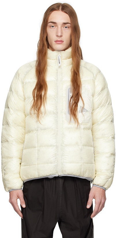 Photo: and wander Off-White Diamond Stitch Packable Down Jacket