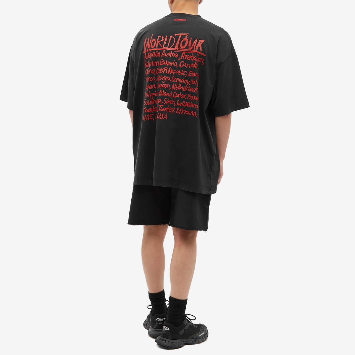 Vetements Men's World Tour Logo T-Shirt in Washed Black Vetements Men's World Tour Logo T-Shirt in Washed Black