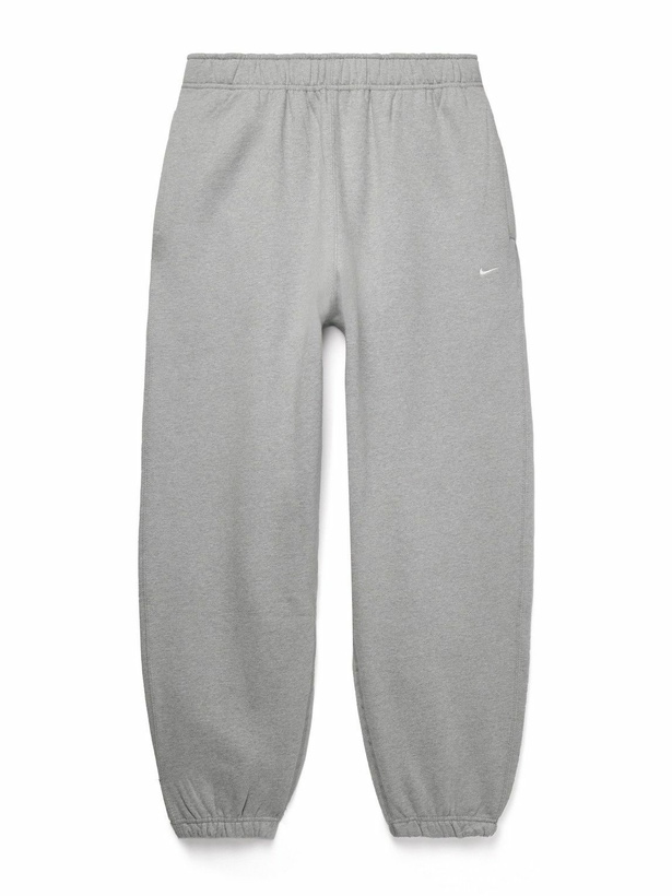 Photo: Nike - Solo Swoosh Tapered Logo-Embroidered Cotton-Blend Jersey Sweatpants - Gray