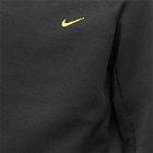 Nike Men's x NOCTA Tech Fleece Crew Sweat in Black/University Gold