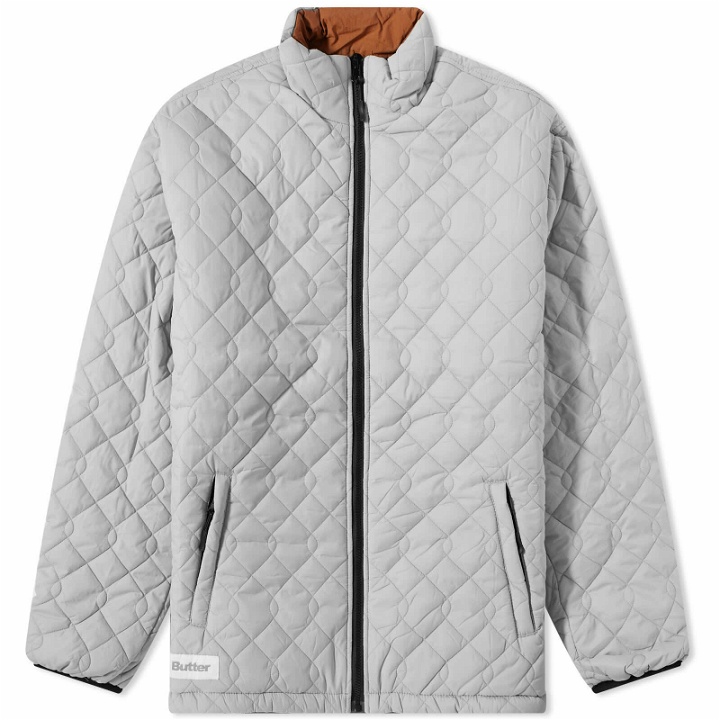 Photo: Butter Goods Men's Chain Link Reversible Puffer Jacket in Stone/Brown