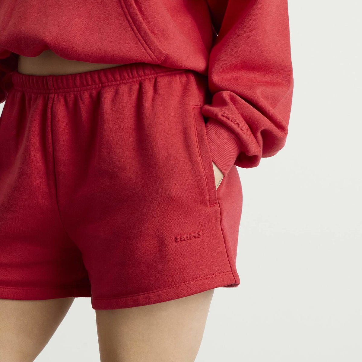 SKIMS Women's Cotton Fleece Classic Short in Washed Red