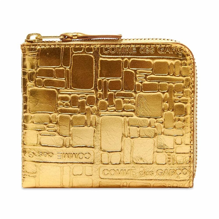 Photo: Comme des Garçons SA3100EG Embossed Logo Wallet in Gold