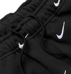 Nike - NRG Tapered Logo-Embroidered Fleece-Back Cotton-Blend Jersey Sweatpants - Black