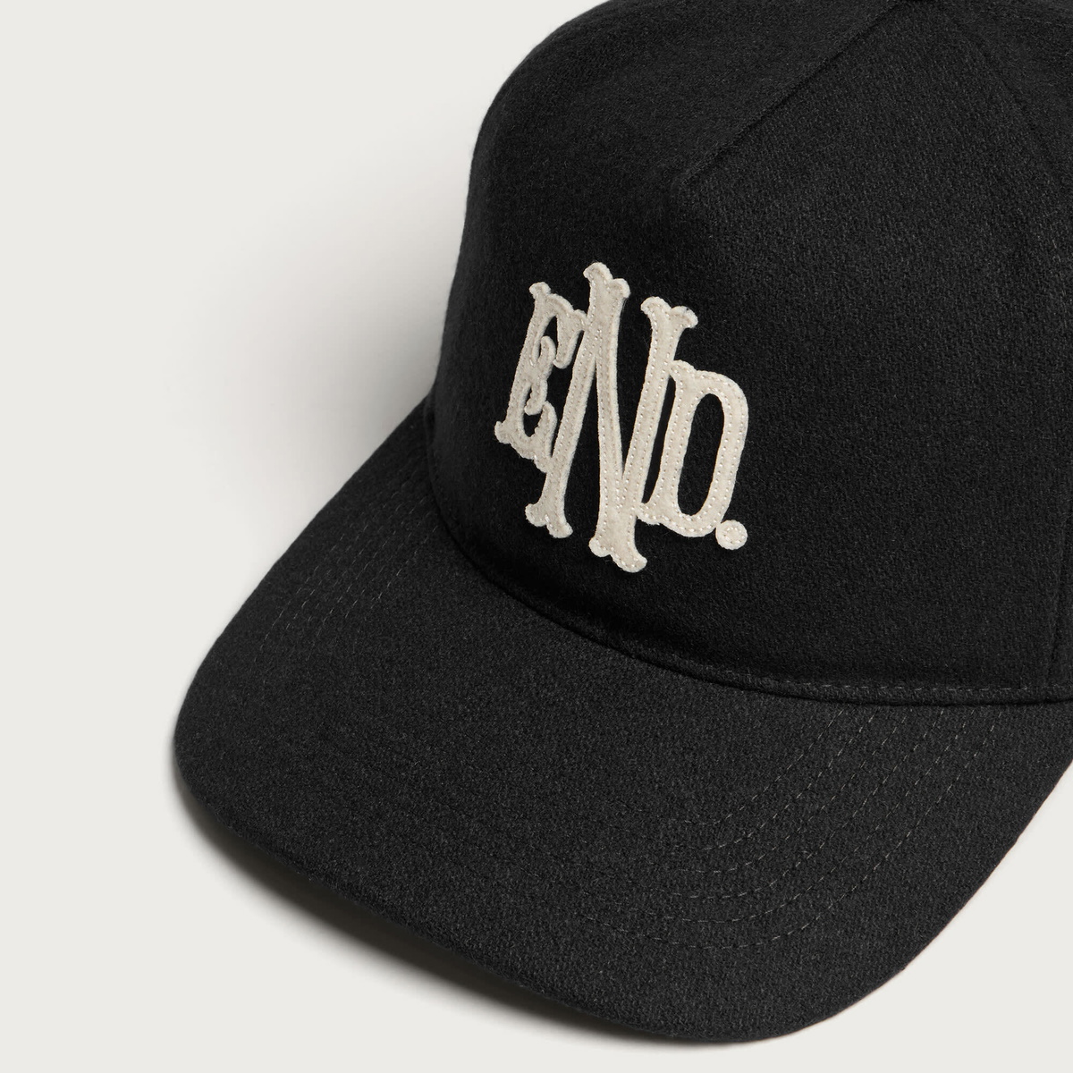 END. Monogram Hitch LC Cap in Black