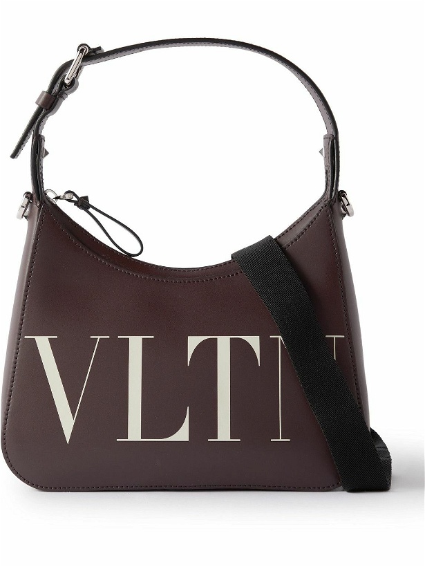 Photo: Valentino - Valentino Garavani Logo-Print Leather Messenger Bag