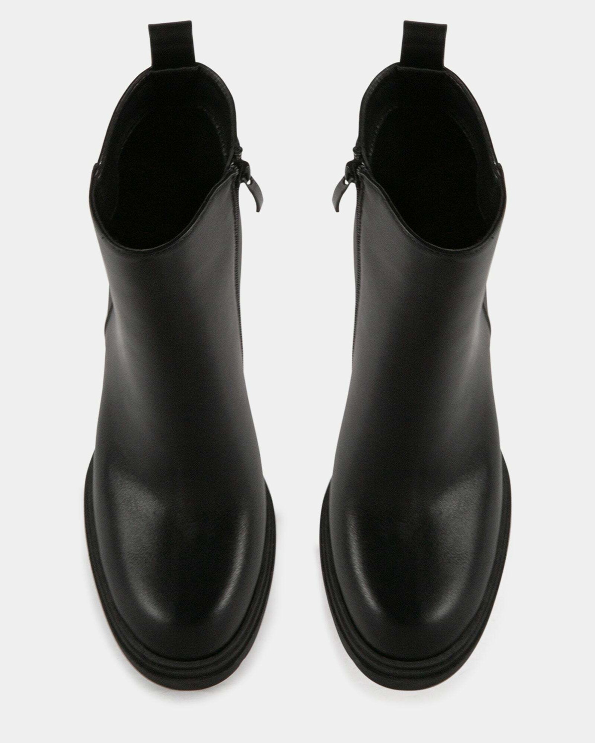 Steve Madden Blured Booties in Black