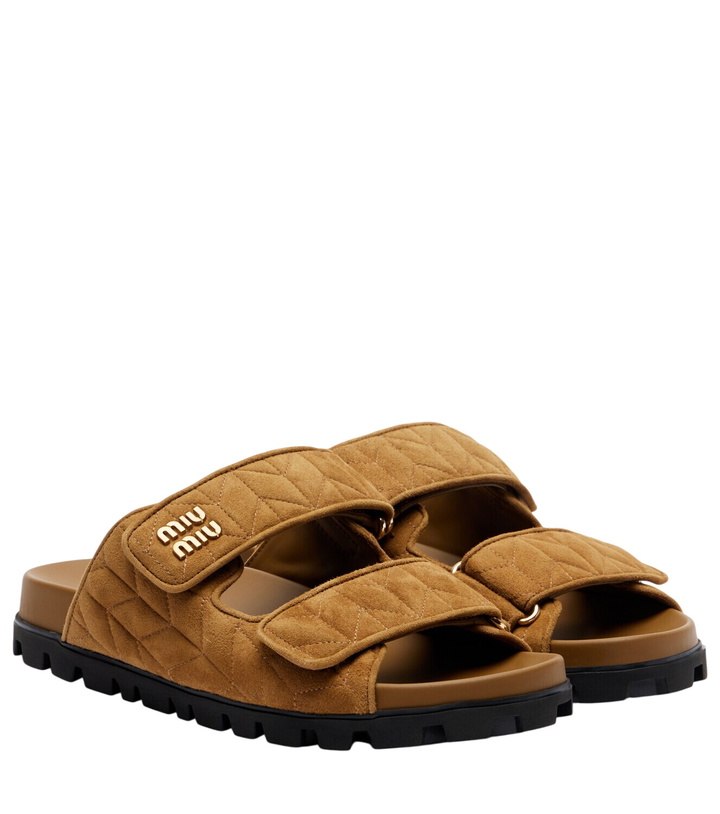 Photo: Miu Miu Quilted suede slides