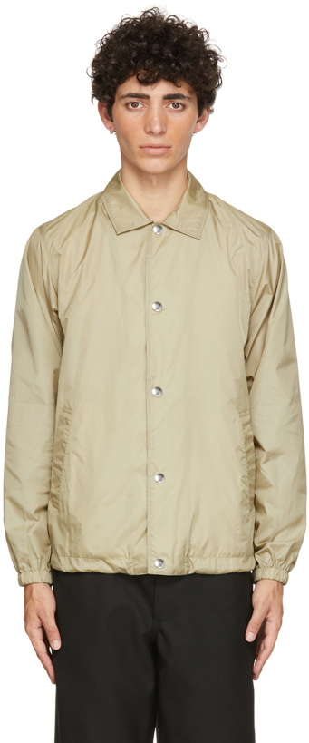 Photo: Comme des Garçons Shirt Beige Yue Minjun Edition Print Coach Jacket