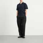 Homme Plissé Issey Miyake Men's Pleat Polo Shirt in Navy