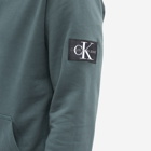 Calvin Klein Men's Monogram Sleeve Badge Hoody in Dark Green