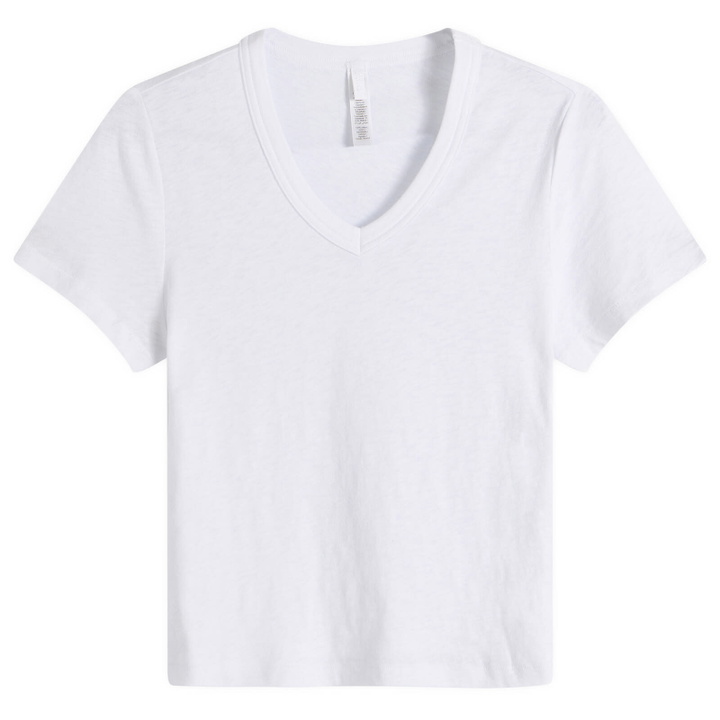 Photo: SKIMS Women's Worn In Jersey Baby V Neck T-Shirt in Snow
