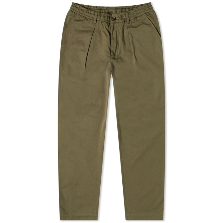 Photo: Universal Works Men's Pleated Track Pant in Light Olive