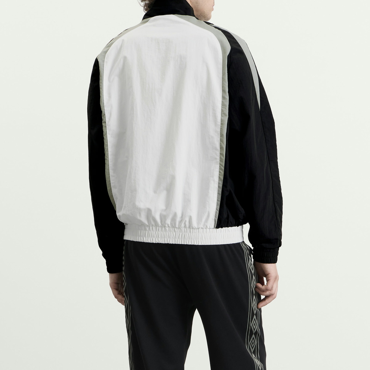 Umbro Men's Relaxed Track Jacket in Brilliant White/Black/Neutral Gray