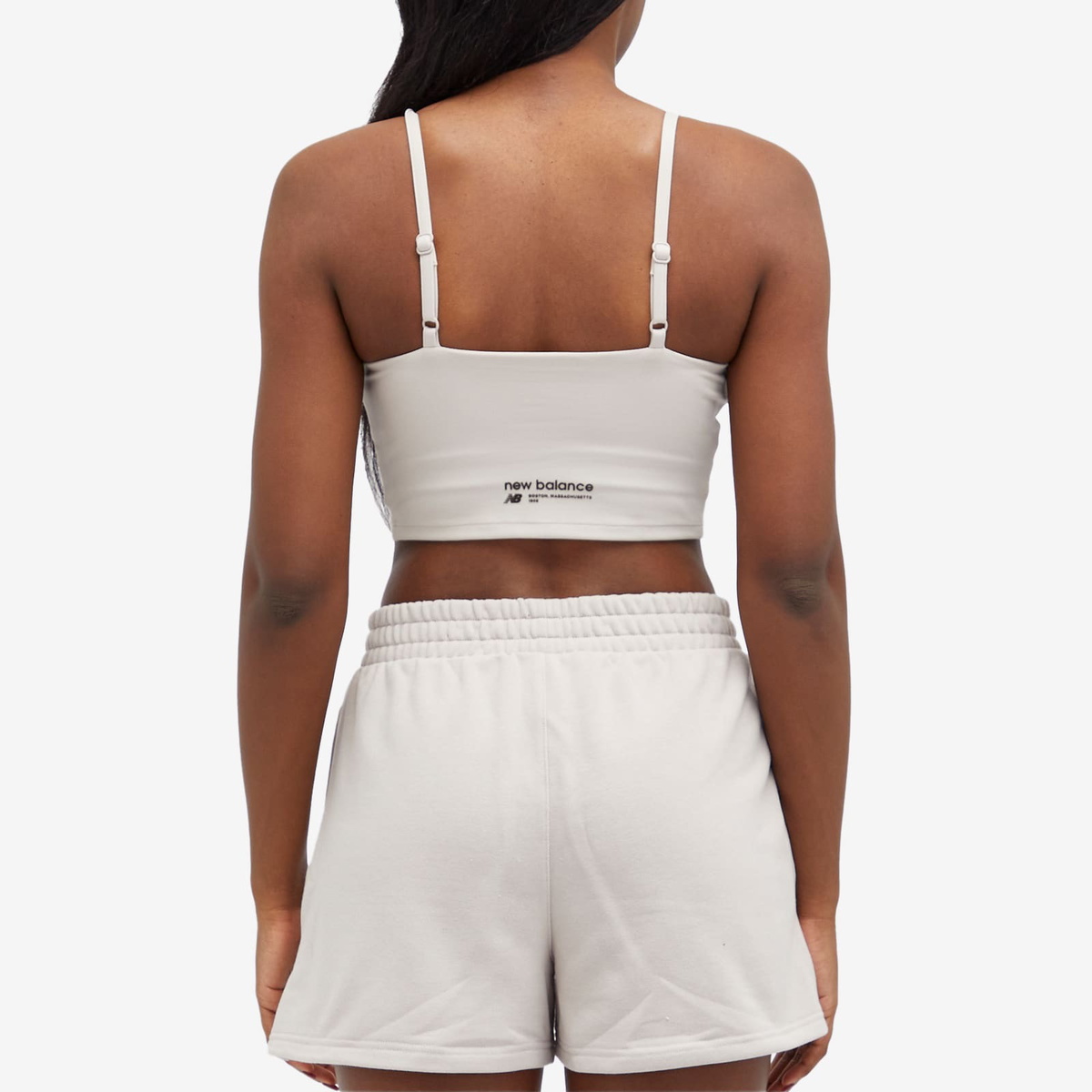 New Balance Women's Linear Heritage Soft Bra Top in Moonrock