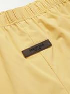 FEAR OF GOD ESSENTIALS - Logo-Appliquéd Stretch-Shell Drawstring Shorts - Yellow