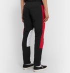 Rhude - Color-Block Logo-Appliquéd Shell Trousers - Black