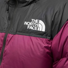 The North Face Men's 1996 Retro Nuptse Jacket in Boysenberry/Tnf Black