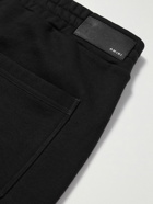 AMIRI - Zoltar Tapered Logo-Print Cotton-Jersey Sweatpants - Black