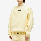 Fear of God ESSENTIALS Men's Spring Tab Detail Sweatshirt in Garden Yellow