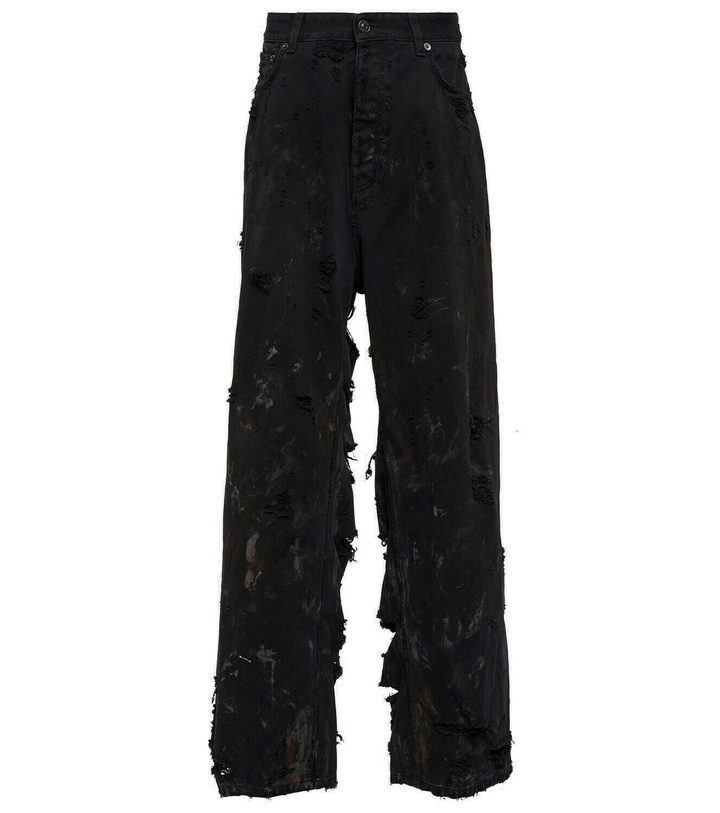 Photo: Balenciaga Distressed wide-leg denim jeans