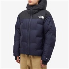 The North Face Men's x Undercover Cloud Down Nupste Jacket in Tnf Black/Aviator Navy