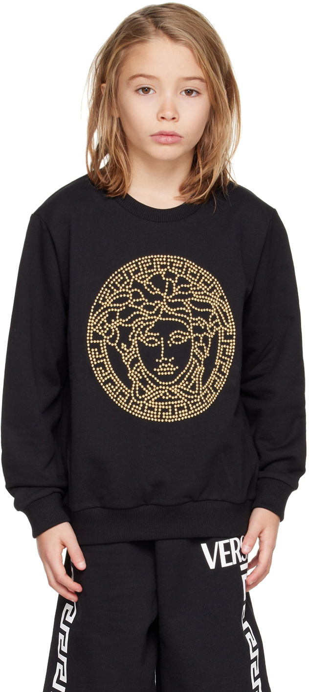 Versace kids buying sweatshirt