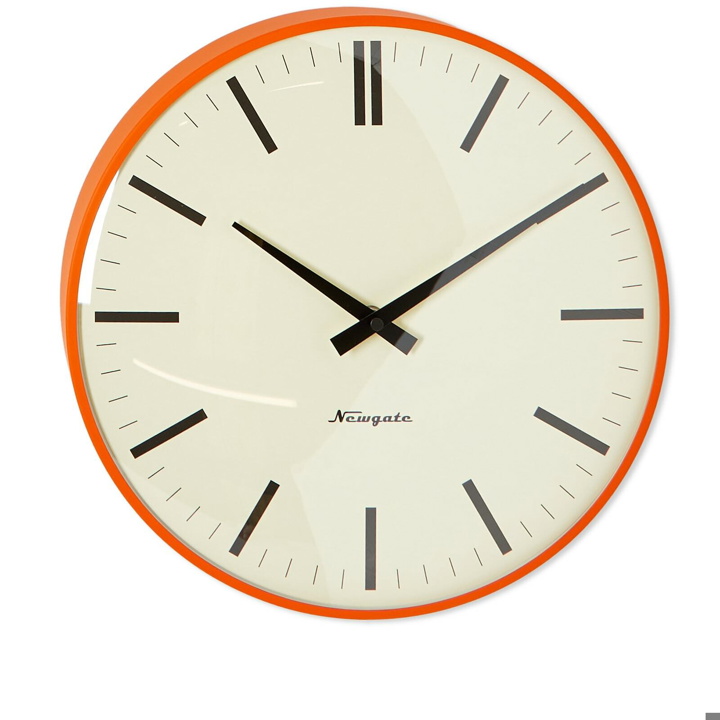 Photo: Newgate Clocks Radio City Bowery Dial Wall Clock in Orange