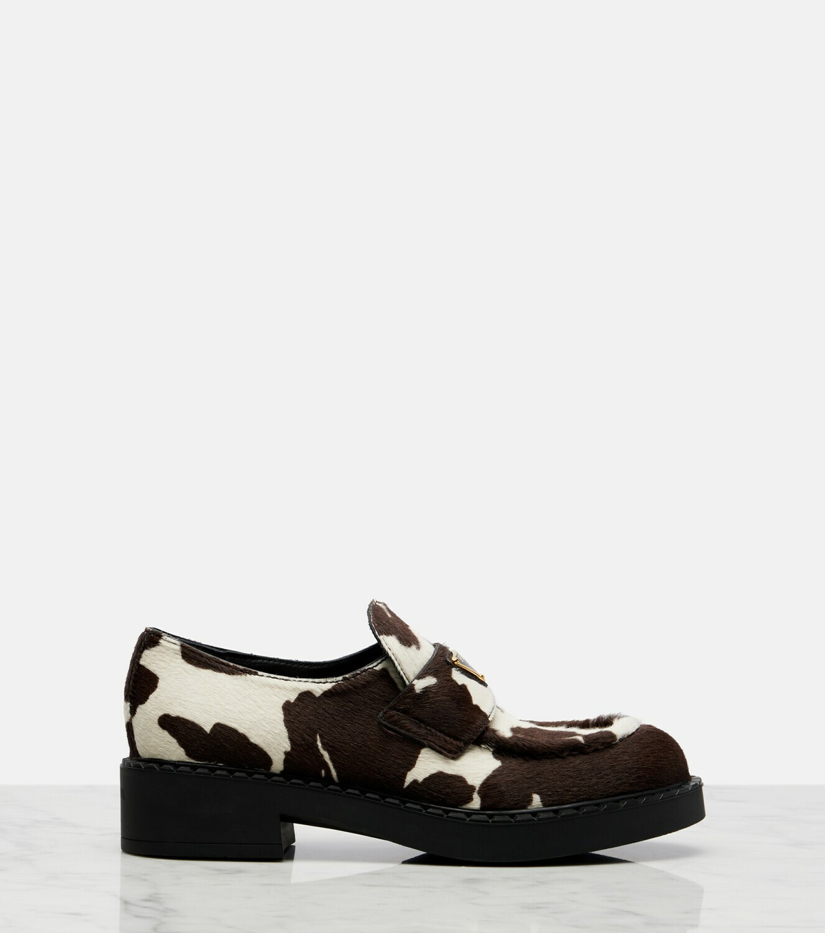 Prada Chocolate cow-print calf hair loafers