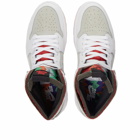 Air Jordan Men's 1 Zoom Air CMFT Sneakers in White/Red. Silver/Concord