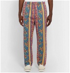 Stüssy - Tapered Printed Cotton-Twill Trousers - Blue