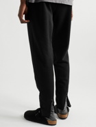 Les Tien - Tapered Garment-Dyed Cotton-Jersey Sweatpants - Black