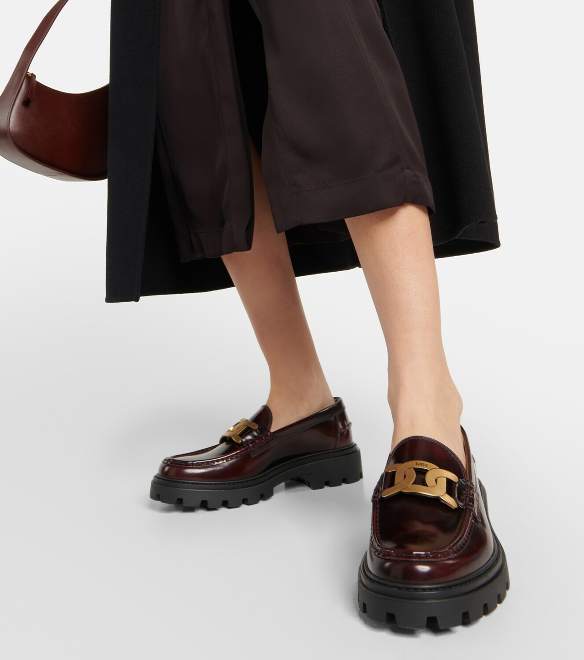 TOD'S Gomma Pesante embellished glossed-leather loafers