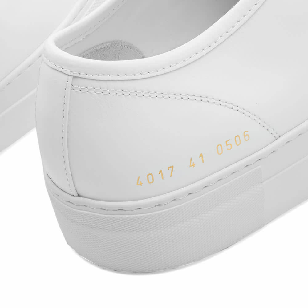 Woman by Common Projects Women's Tournament Super Low Sneakers in White ...