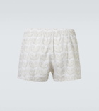 Commas Printed swim trunks