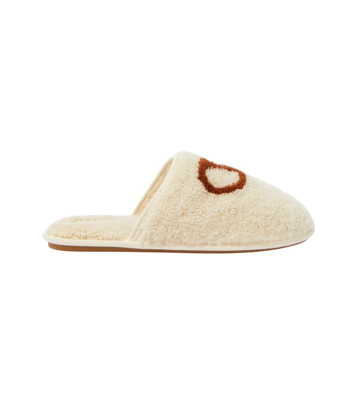 Photo: Valentino Garavani VLogo shearling slippers