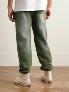 Y,IWO - Hardwear Logo-Print Distressed Cotton-Jersey Sweatpants - Green