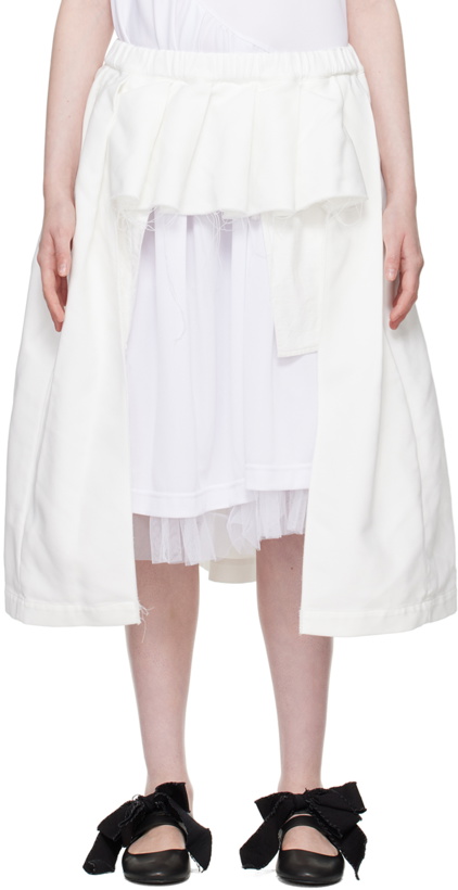 Photo: Black Comme des Garçons White Cutout Miniskirt