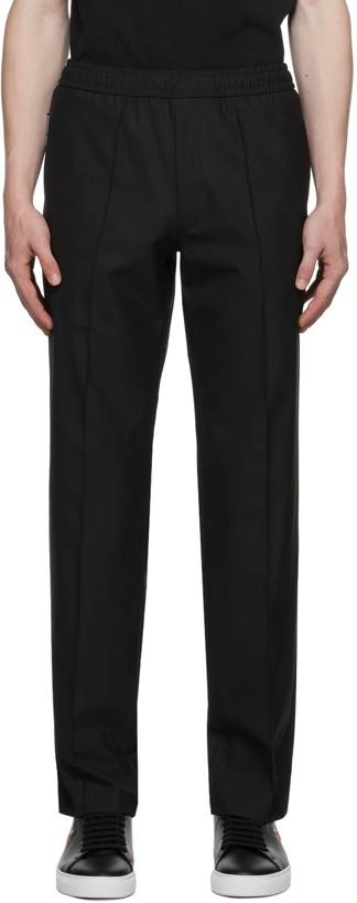 Photo: Axel Arigato Black Wool Signature Trousers