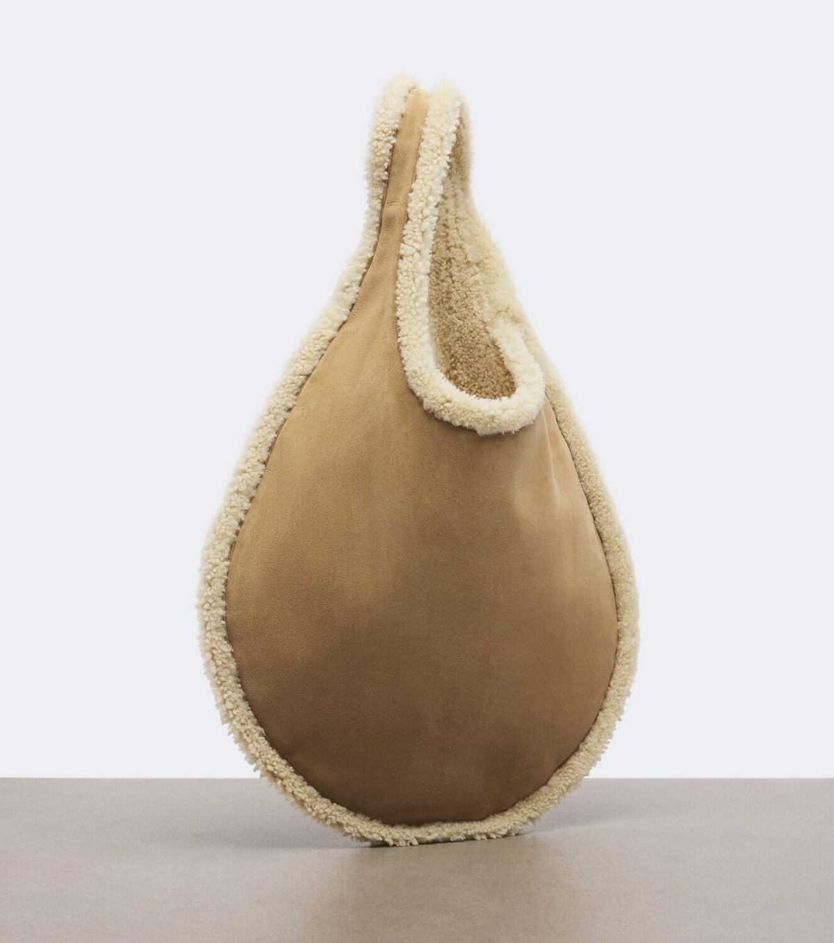 Alaïa One Piece shearling-lined suede shoulder bag