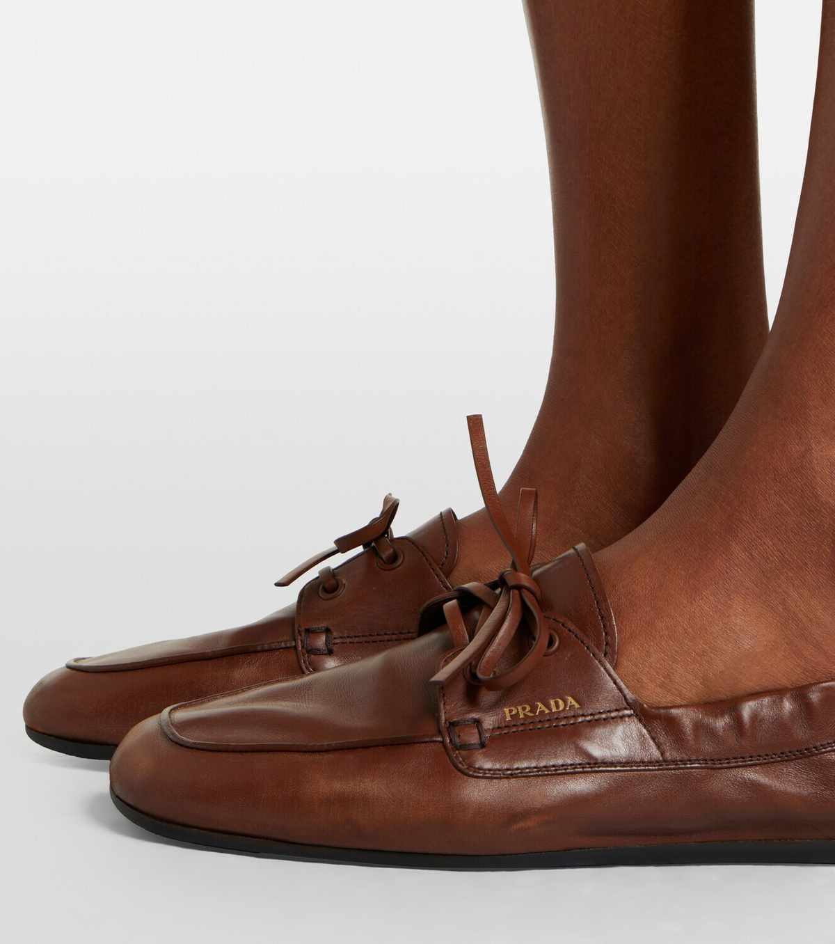 Prada Shuffle leather boat shoes