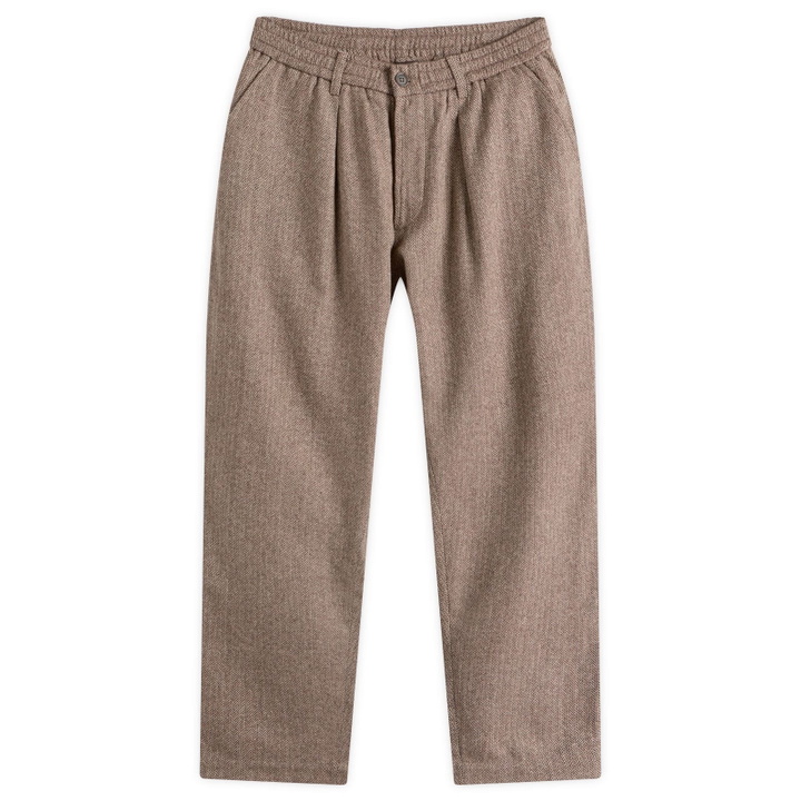 Photo: Universal Works Men's Wool Herringbone Pleated Track Pant in Brown