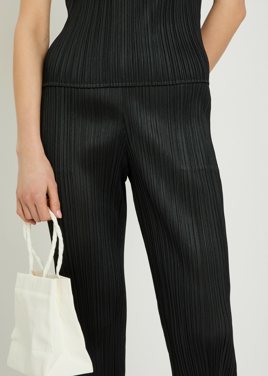 Pleats Please Issey Miyake Pleated Tapered-leg Woven Trousers Black