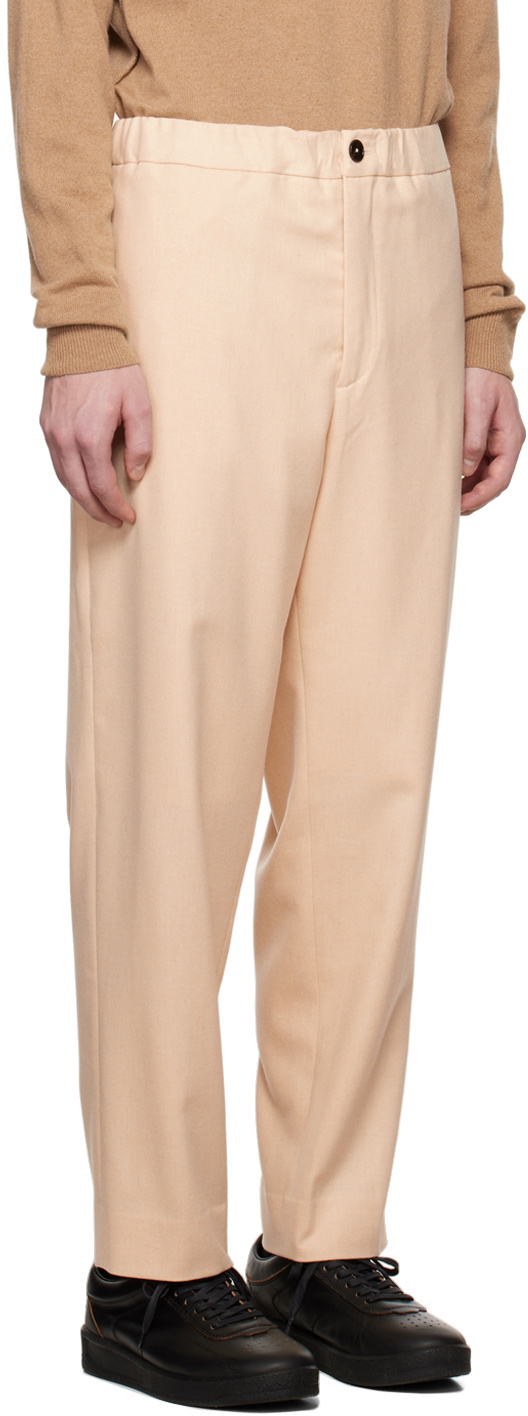 https://cdn.clothbase.com/uploads/e444a08c-68ab-4033-a9e1-11868f93af2a/beige-elasticized-waistband-trousers.jpg