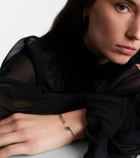 Stone and Strand 14kt gold (585/1000) cuff bracelet with emeralds and diamonds