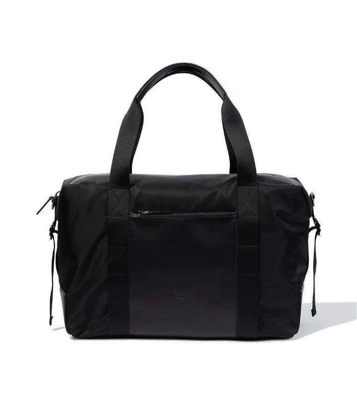 Photo: Tod's Large leather-trimmed duffel bag